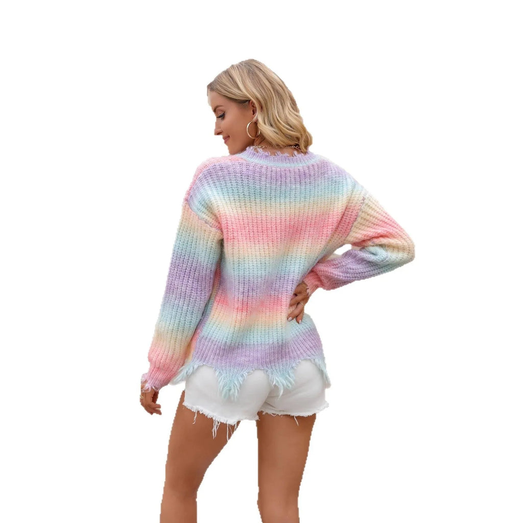 Pink rainbow gradient acrylic knitted pullover sweater with loose cut silhouette and tassel details