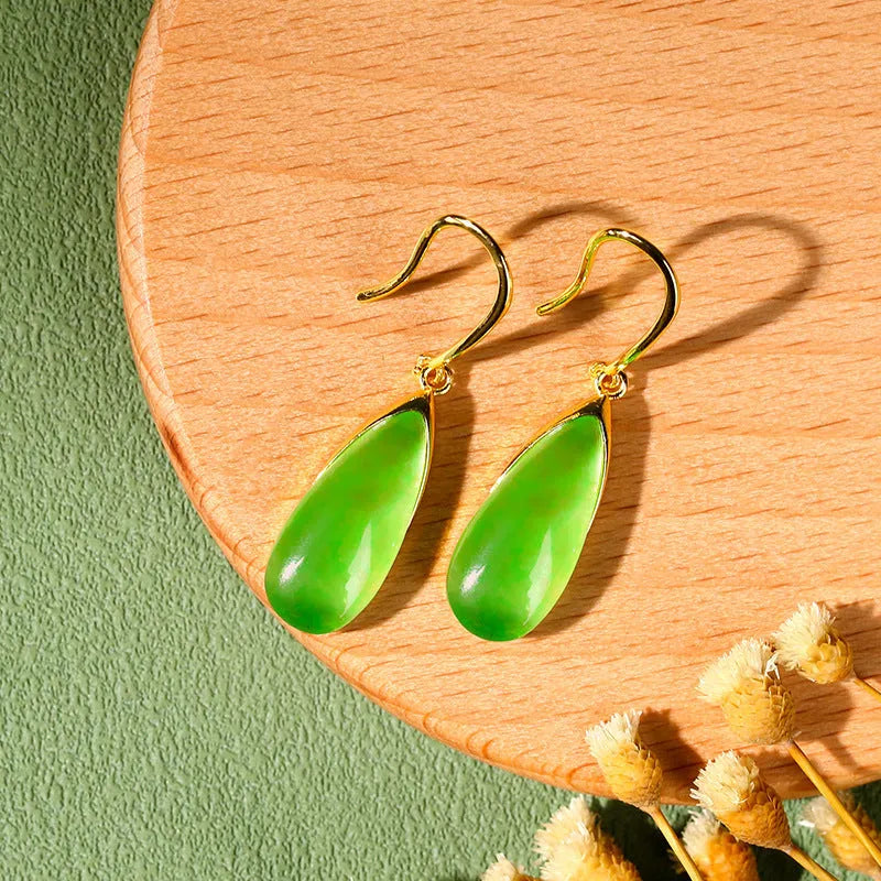 A pair of geometric copper earrings with a water droplet design and jade CP798 colour, Chinese style.