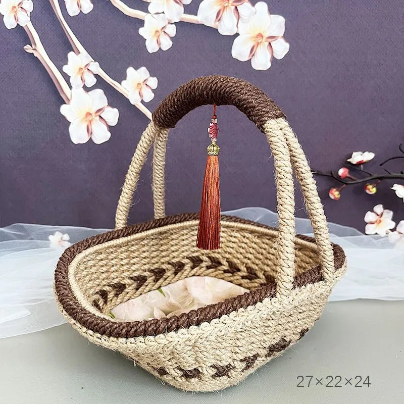 Hand-woven hemp rope basket in natural brown colour measuring 19cm high by 12cm wide