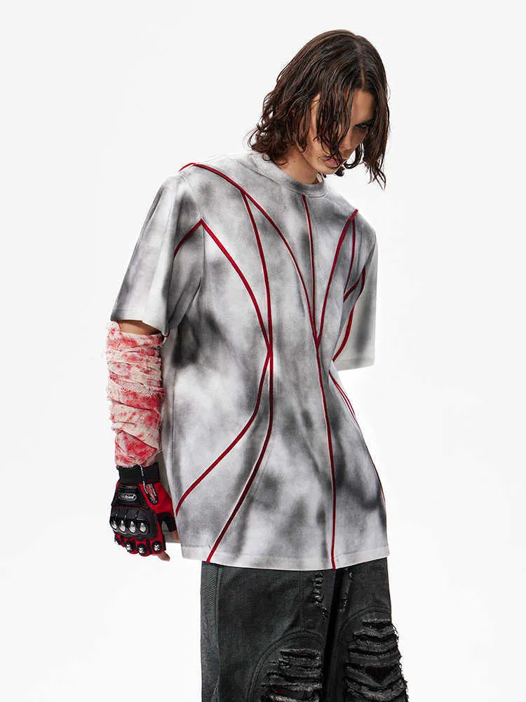Women's short sleeve T-shirt with padded shoulders and raised line patchwork design in a round neck style.