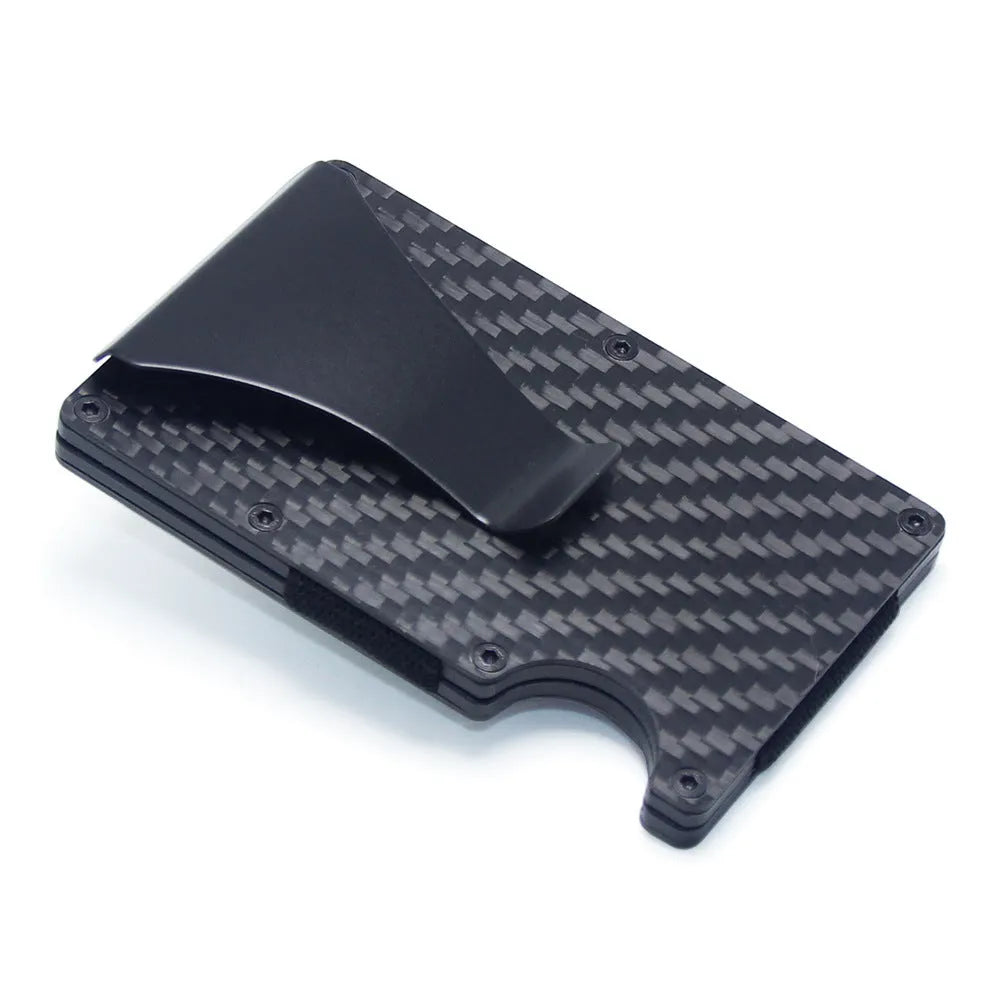 A slim carbon fibre card holder wallet in a geometric design, shown with business cards.