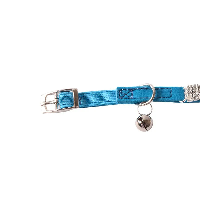 Elastic buckle cat collar with flocking material in gang drill design, shown in multiple colours.