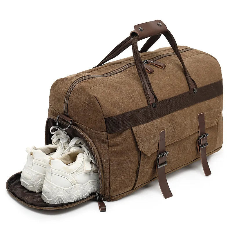 Large capacity canvas crossbody travel bag in black, brown, or grey with visible sewing line detailing