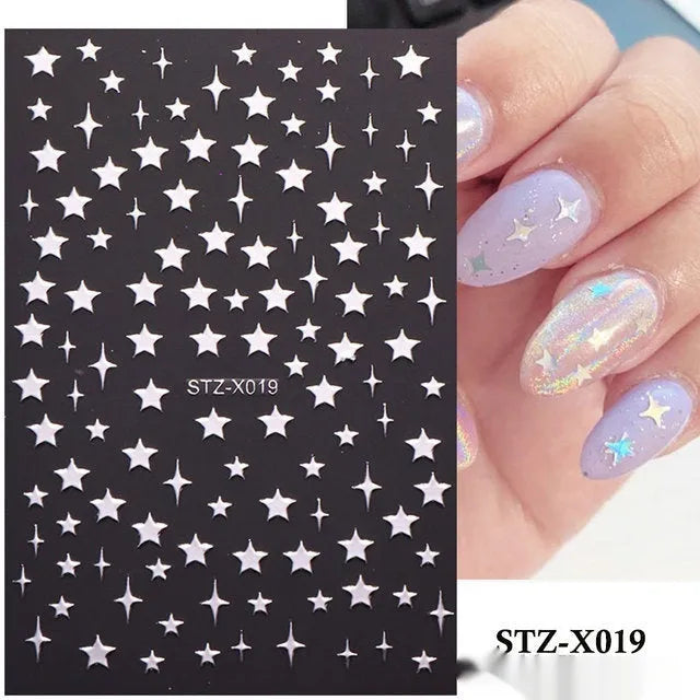 Black and silver stripe nail art sticker with a love pattern design on a plastic sheet.
