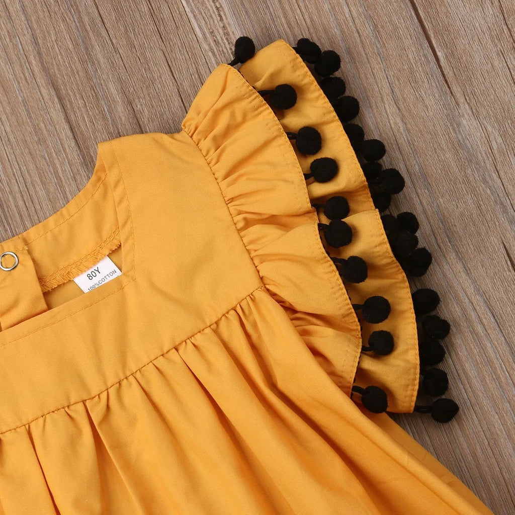 Sleeveless orange cotton girls dress for toddlers and children sizes 12M to 5T