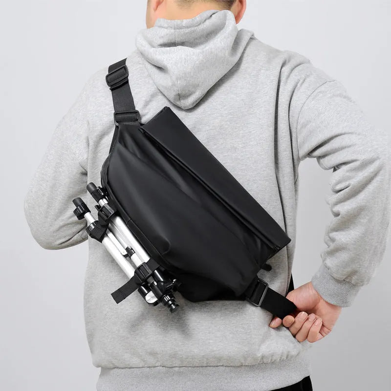 Grey PU crossbody bag for men with zippered main compartment and single shoulder strap