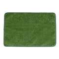 Green dog grass pee pad with realistic texture and drainage holes