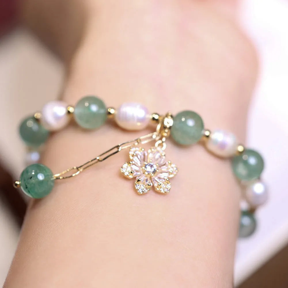 Green freshwater pearl bracelet with Chinese knot design and peace buckle closure