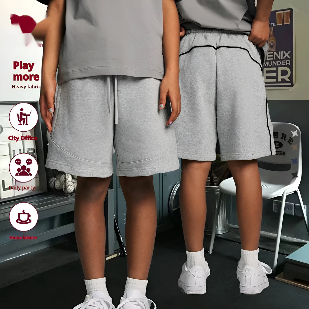 Children's cotton sports shorts in solid colours with loose fit design for active wear