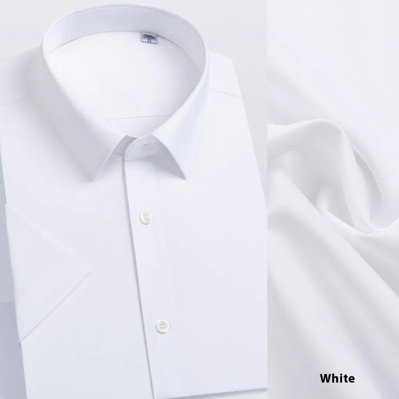Man wearing a light blue long-sleeved non-iron business casual shirt with a regular fit.