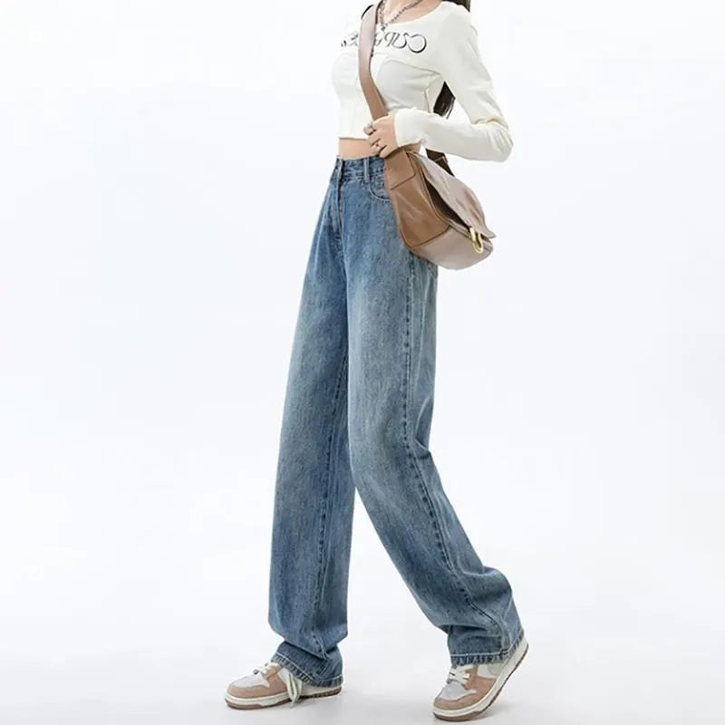 Women's retro blue high-waist wide leg jeans laid flat, showing the straight-leg trousers cut.