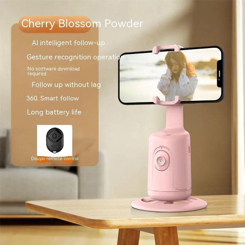 New Automatic Tracking Stabiliser with 360° rotation, ABS body, dark black colour, on a desktop with USB cable