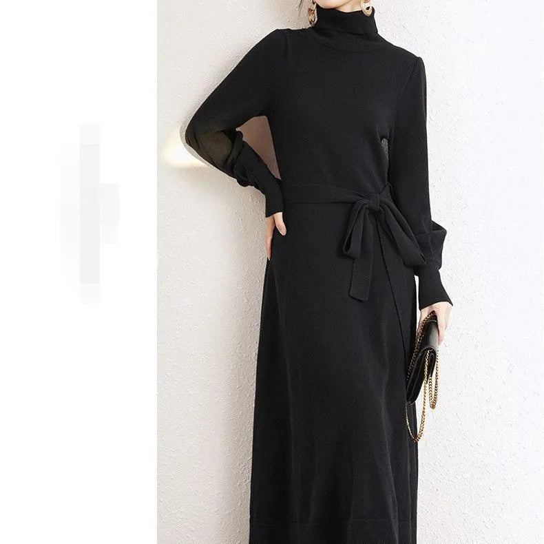 Rose red turtleneck knit dress with long sleeves, elastic waist, and loose mid-length sweater skirt hem.