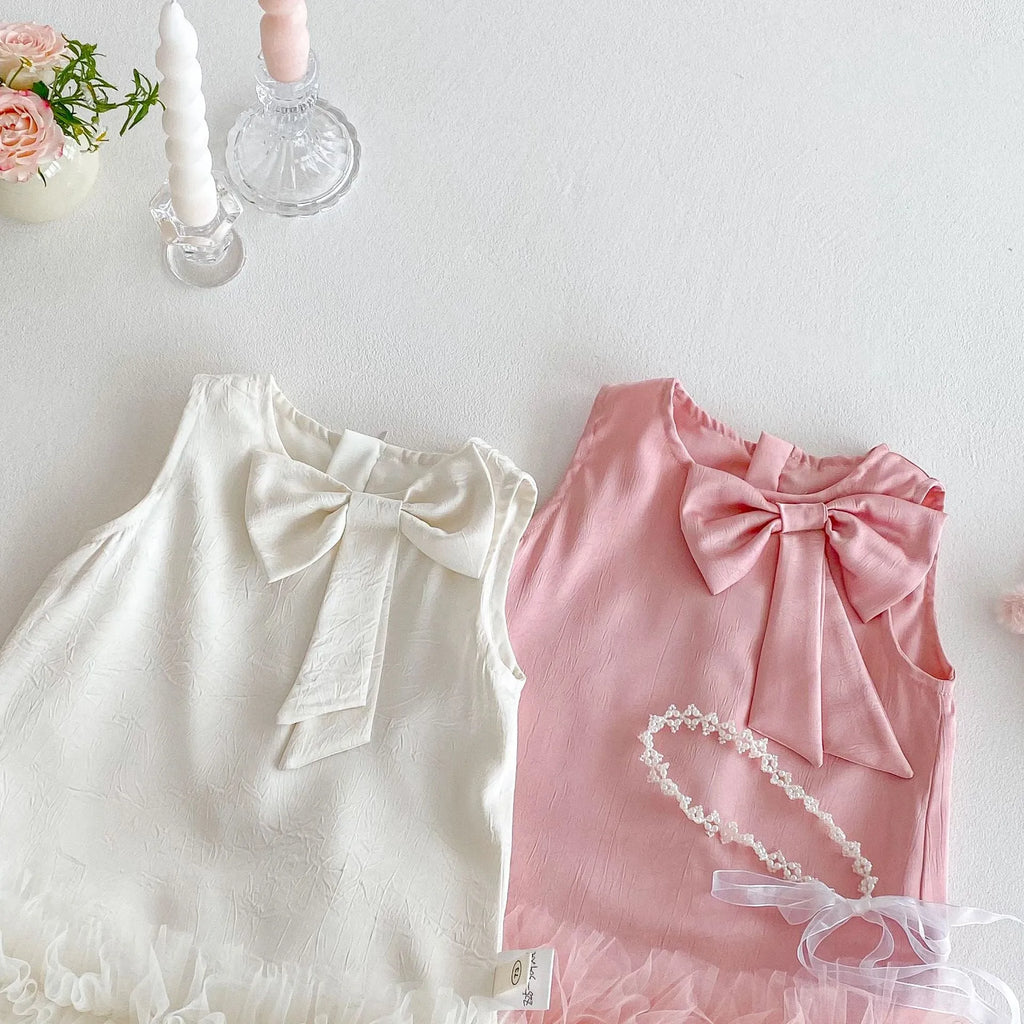 Children's Korean-style solid colour polyester dress with bow in cream rice shade for heights 73-120 cm