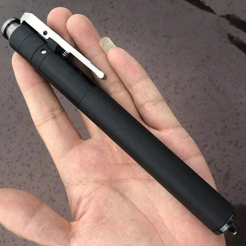 Titanium black aluminium alloy automatic spring expandable baton on dark background