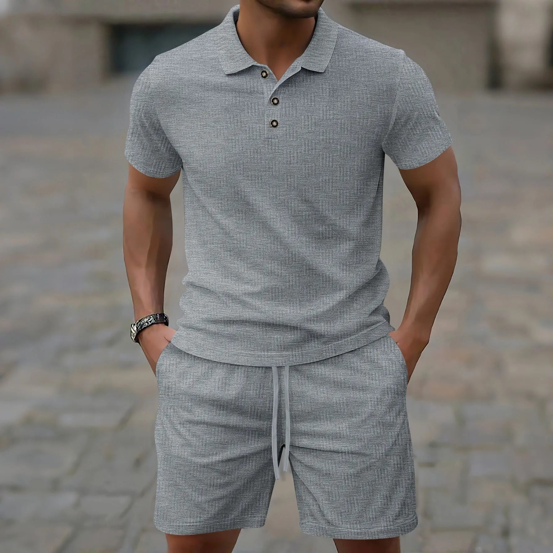 Men's solid colour jacquard short sleeve casual suit with matching shorts on a hanger.