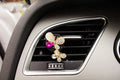 Cartoon alloy car air freshener clip with fruity liquid scent in a choice of twelve decorative styles