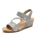 Women's platform sandals with soft leather bottom and middle heel in gold, grey, or pink
