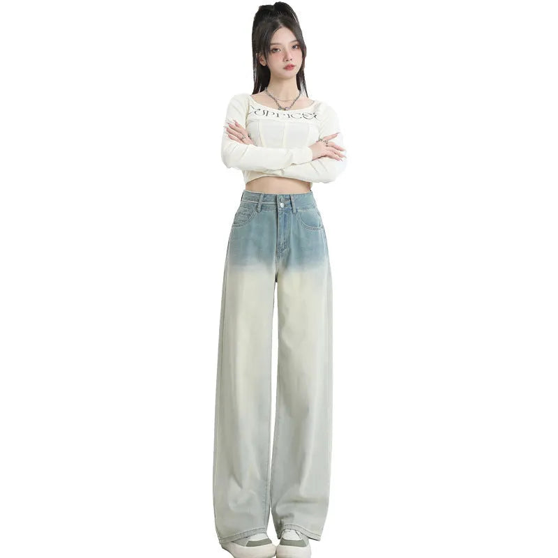 Women's gradient blue straight-leg denim trousers with wide leg style on hanger