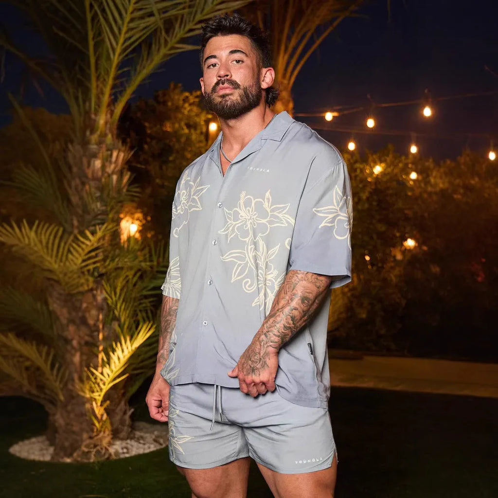 Men's printed casual loose short sleeve top in beige with floral pattern, short sleeves, and cardigan style