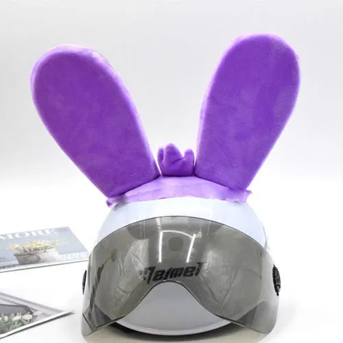 Rabbit Glow helmet decoration with Velcro bottom on a ski helmet, shown in blue LED style.