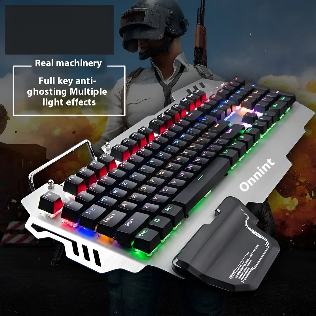 Silver metal gaming keyboard with wrist splint accessory on desktop