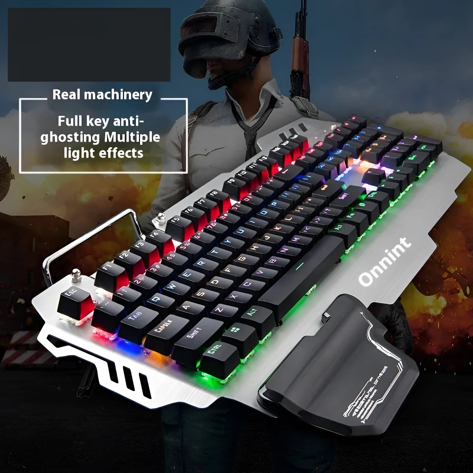 Silver metal gaming keyboard with wrist splint accessory on desktop