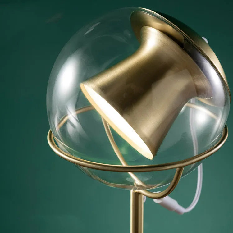 Light luxury creative glass lampshade dimmable desk lamp with LED and touch switch on a desk