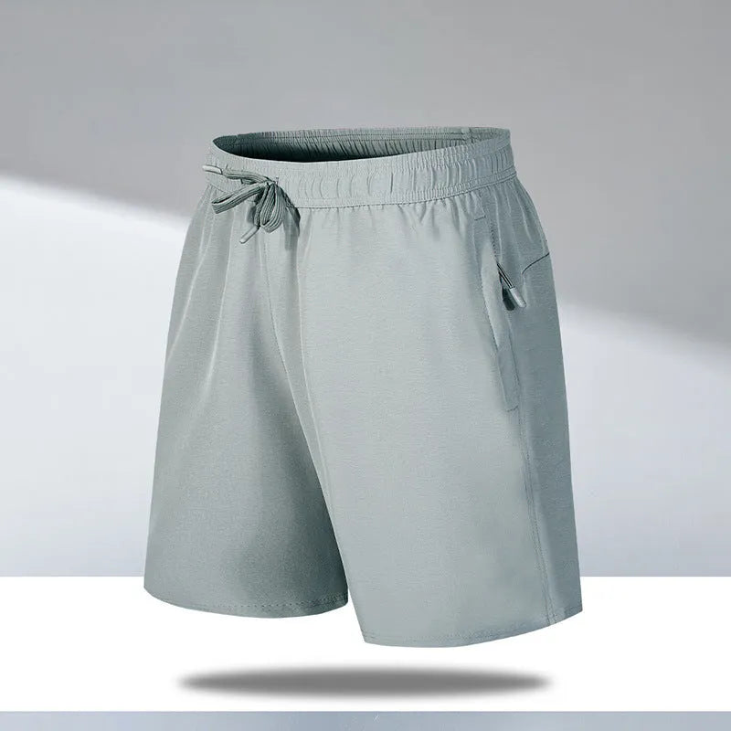 Men's loose fit quick-drying sports shorts in ice silk polyester fabric with micro-elastic waistband