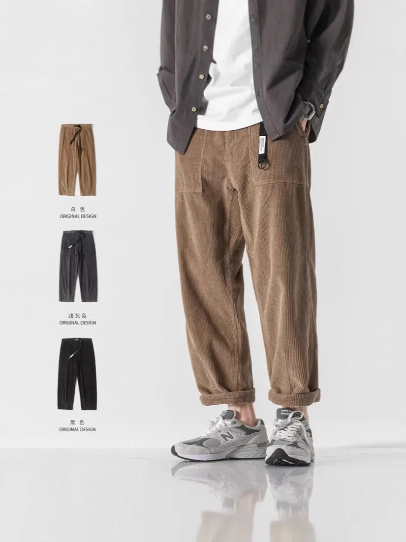 Loose straight tapered trousers in chemical fibre blend fabric, available in multiple sizes and colours