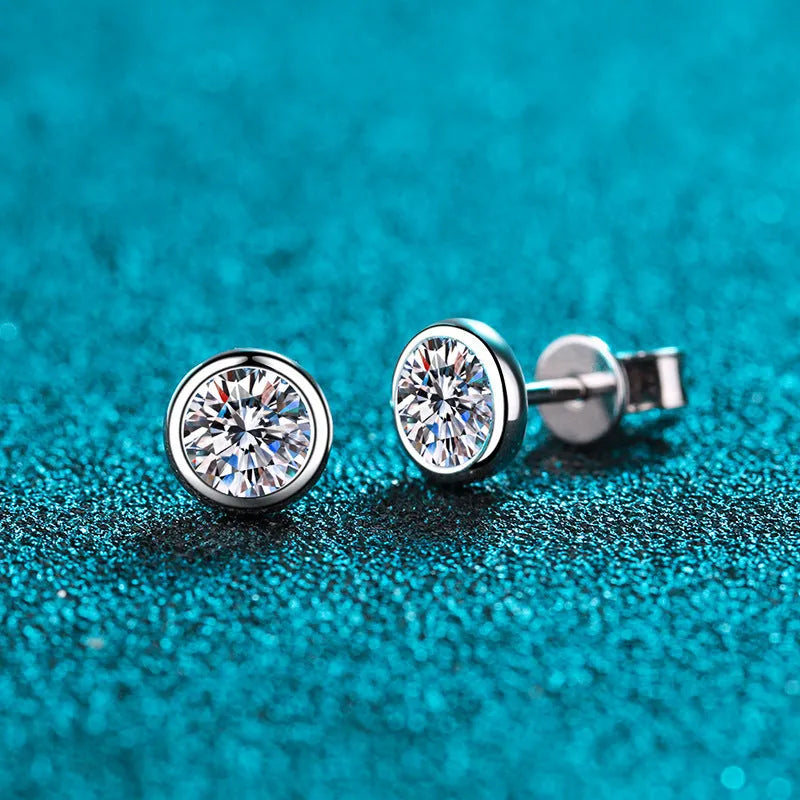 Geometric gold-plated sterling silver women's earrings with a moissanite or zircon centre stone.