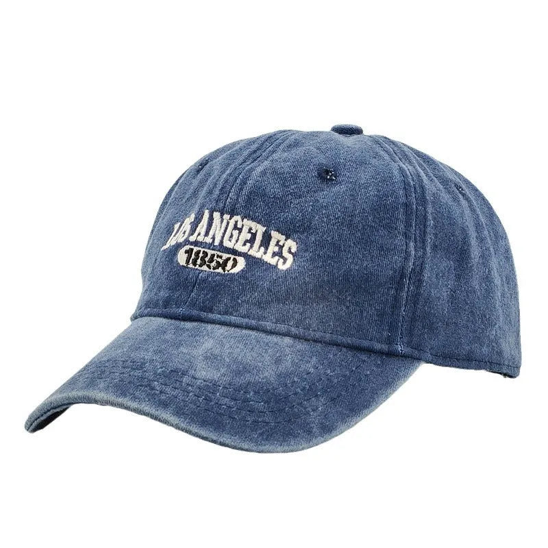 Retro personalised peaked cap with letters embroidery in beige, adjustable strap visible.
