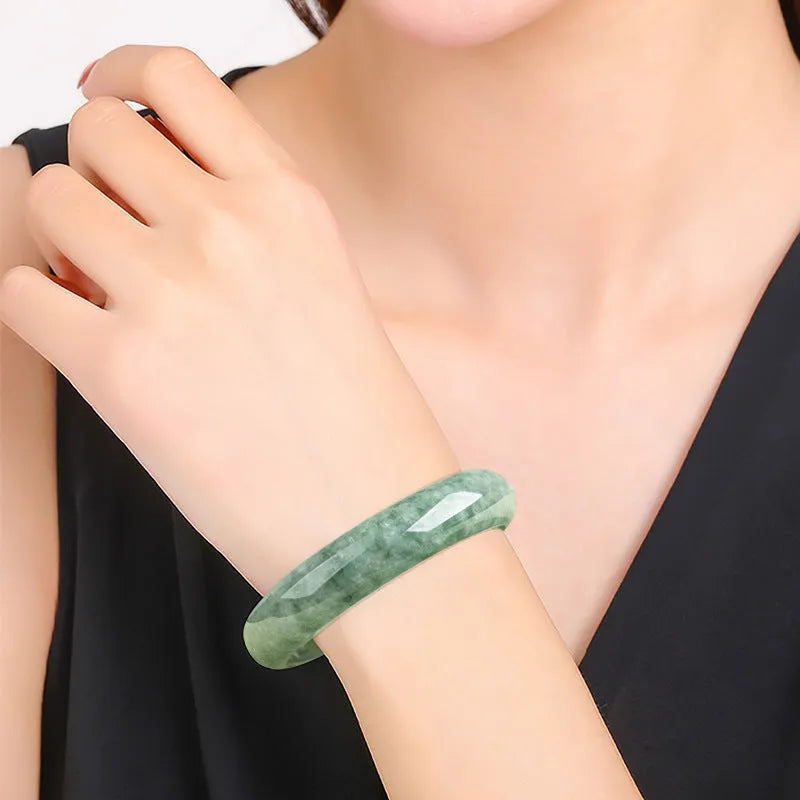 Dark pea green jade beaded bracelet for women on a gift box with certificate.
