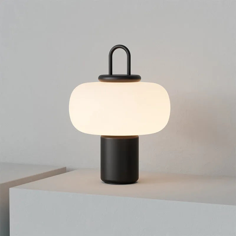 Minimalist clear glass bedside table lamp for children's bedroom with warm glow and UK plug.