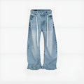 Blue vintage washed denim trousers with drawstring waist and straight-leg cut