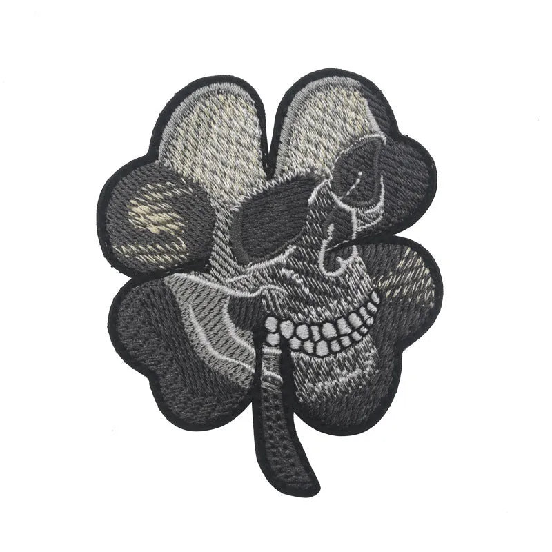 Outdoor embroidered fabric badge with velcro backing showing camouflage design