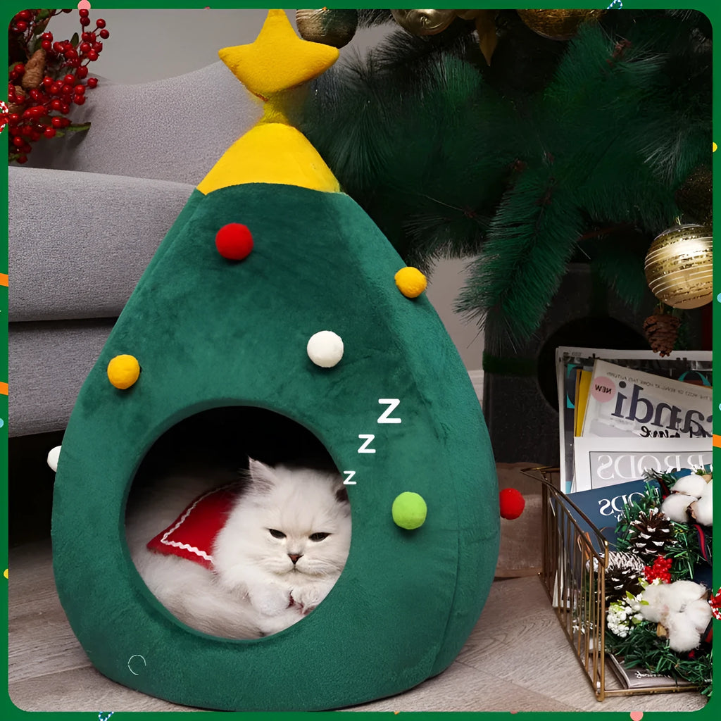 Red Christmas tree-shaped plush cave bed for cats and small dogs on a white background.