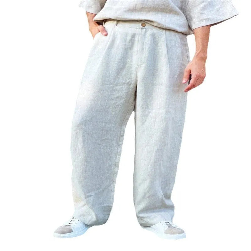 Men's loose high-waist linen jogger pants in a straight-leg cut, shown in a neutral colour.