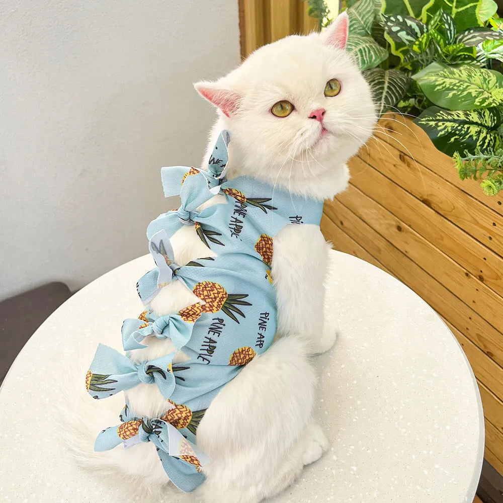 Blue lace-up polyester sterilisation clothing for a cat, shown on a size chart for S, M, and L.