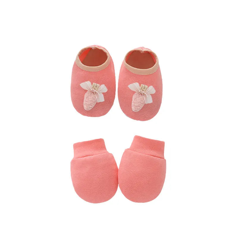Cotton baby gloves and foot cover set in multiple colours including light blue, navy blue, pink, and camel