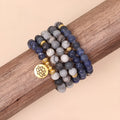 Blue multi-layer bracelet with patterned network stone beads on wrist