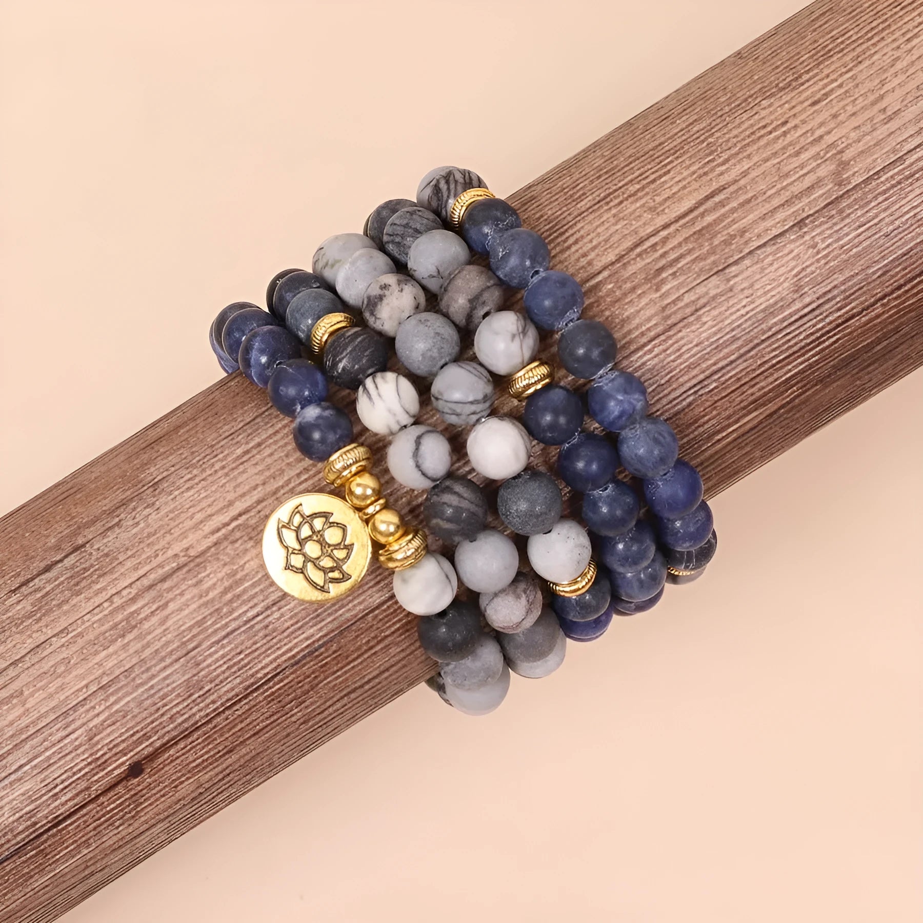 Blue multi-layer bracelet with patterned network stone beads on wrist