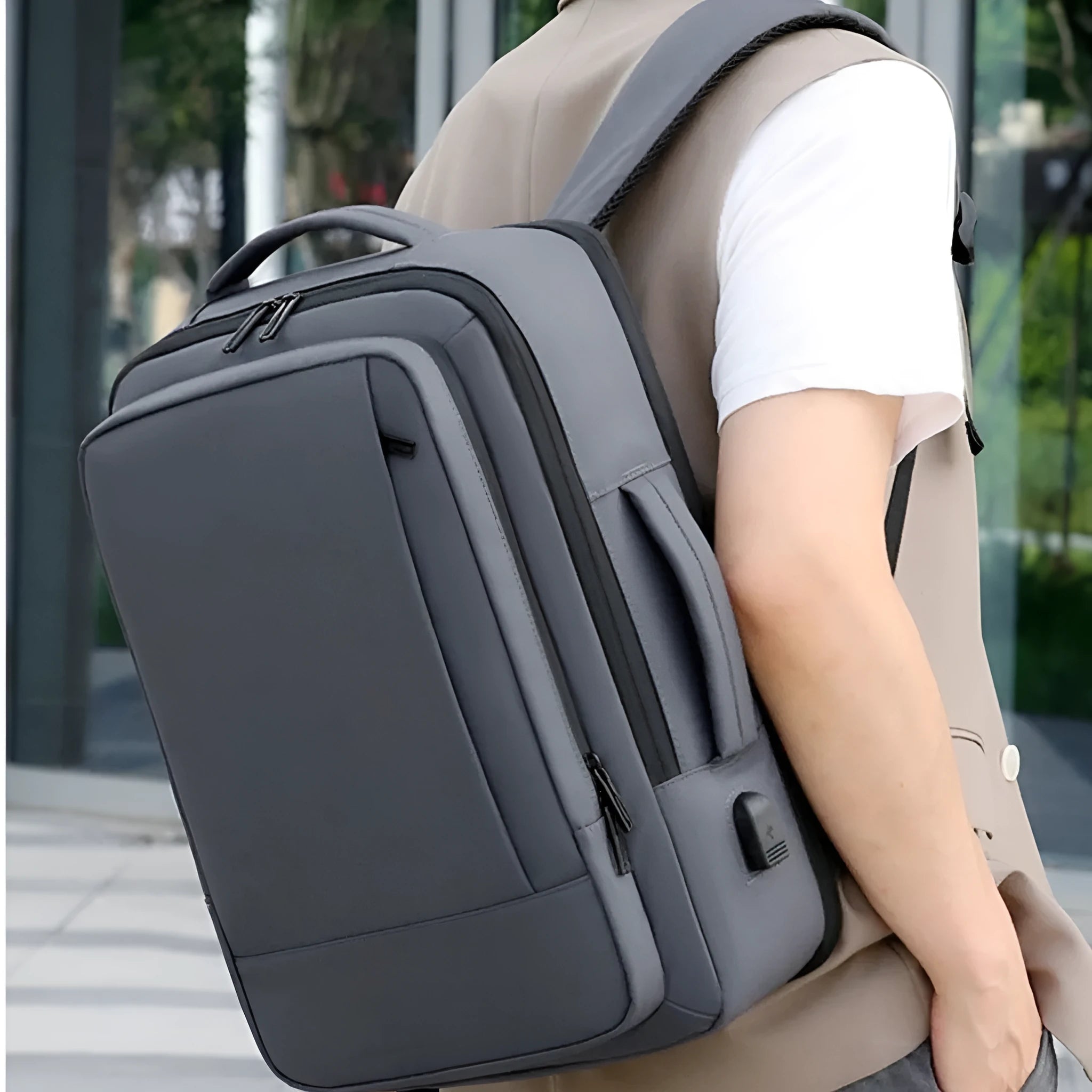 Black waterproof Oxford cloth backpack with curved shoulder straps and business organisation