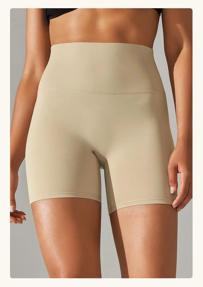 Women's high waist hip lift fitness tights in moisture-wicking fabric for gym and daily wear