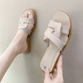 Women's PVC cross strap flip flop sandals in light blue on a white background.
