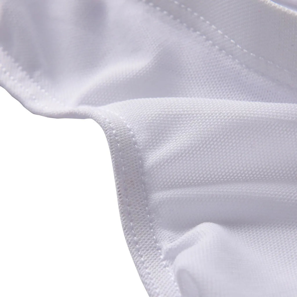 Men's black quick-dry nylon briefs with a low-waisted triangle cut on a white background.