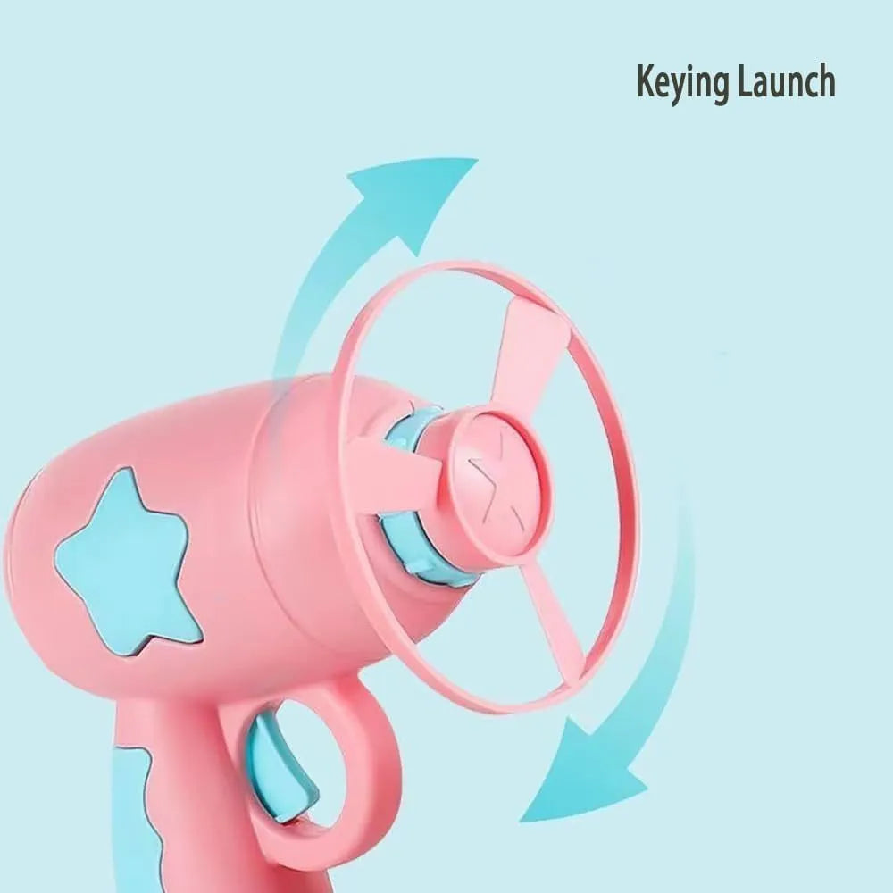 Blue interactive cat toy gun with plastic Frisbee on launch mechanism for indoor hunting play