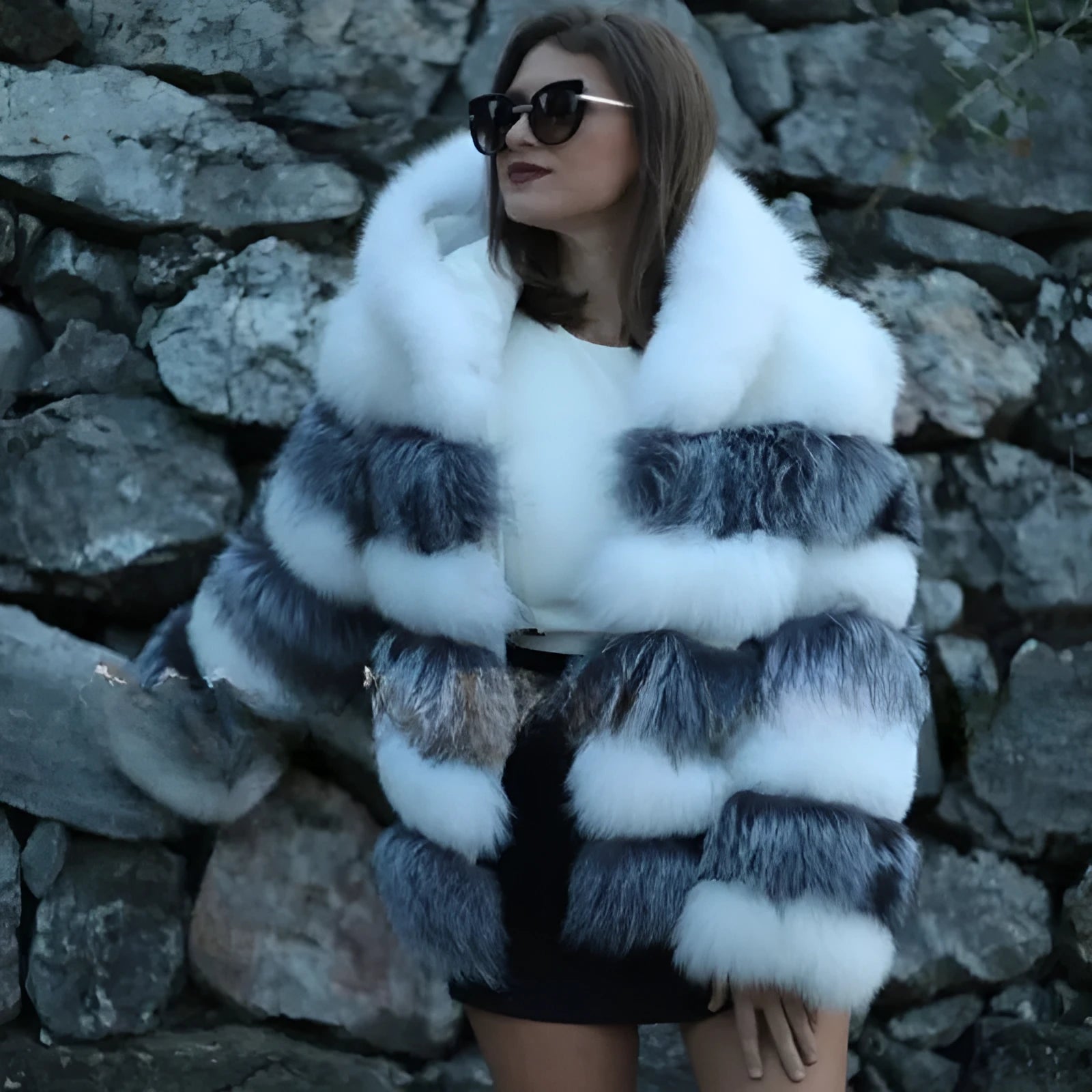 Women's loose-fit artificial fur hooded coat in street fashion style.
