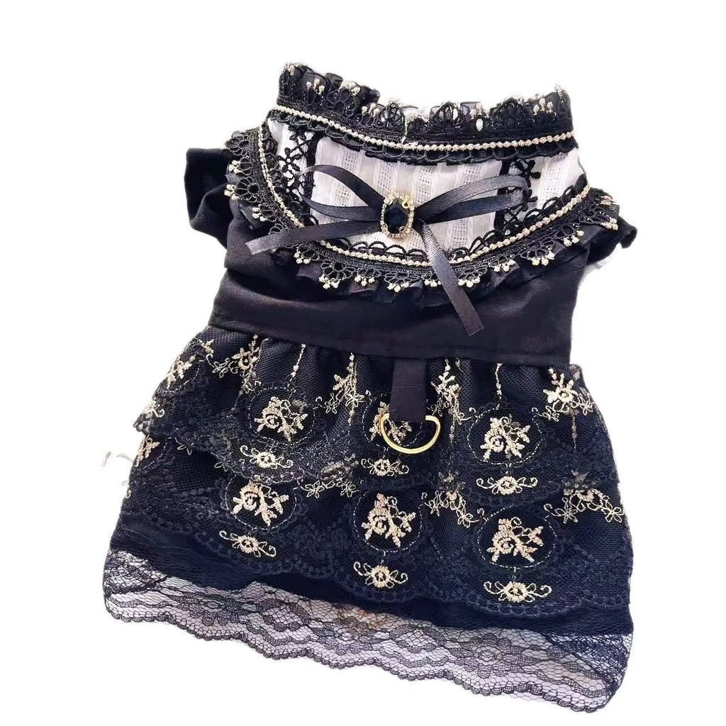 Golden gothic-style skirt dress for cats or dogs on a mannequin showing princess design and polyester fabric