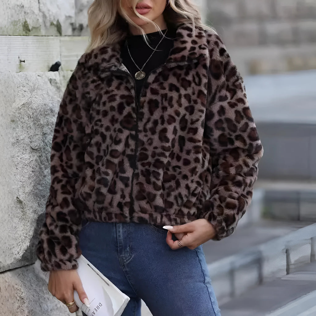 Women's loose fit leopard print plush coat with front zipper closure showing raglan sleeves